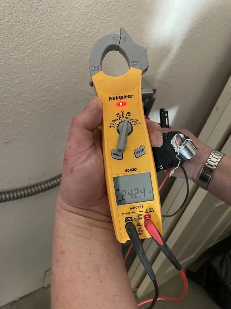 Voltage testing with clamp meter during Generator Installation in West Fargo